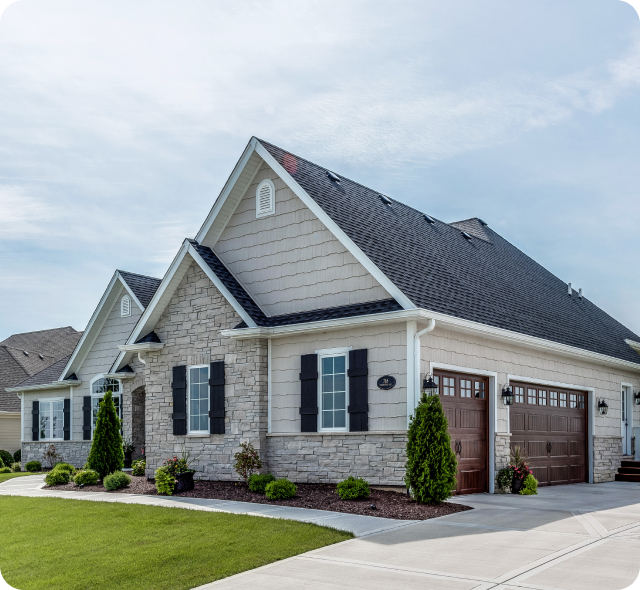 Residential brick home with gabled roof