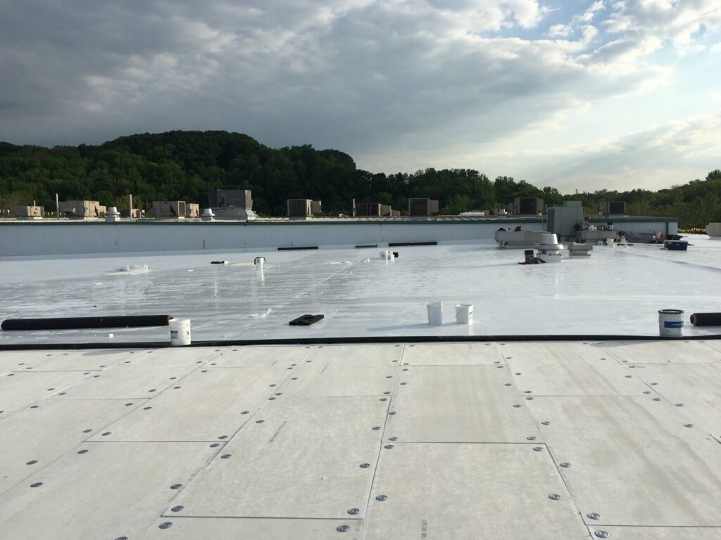 White TPO membrane installed on a flat commercial roof