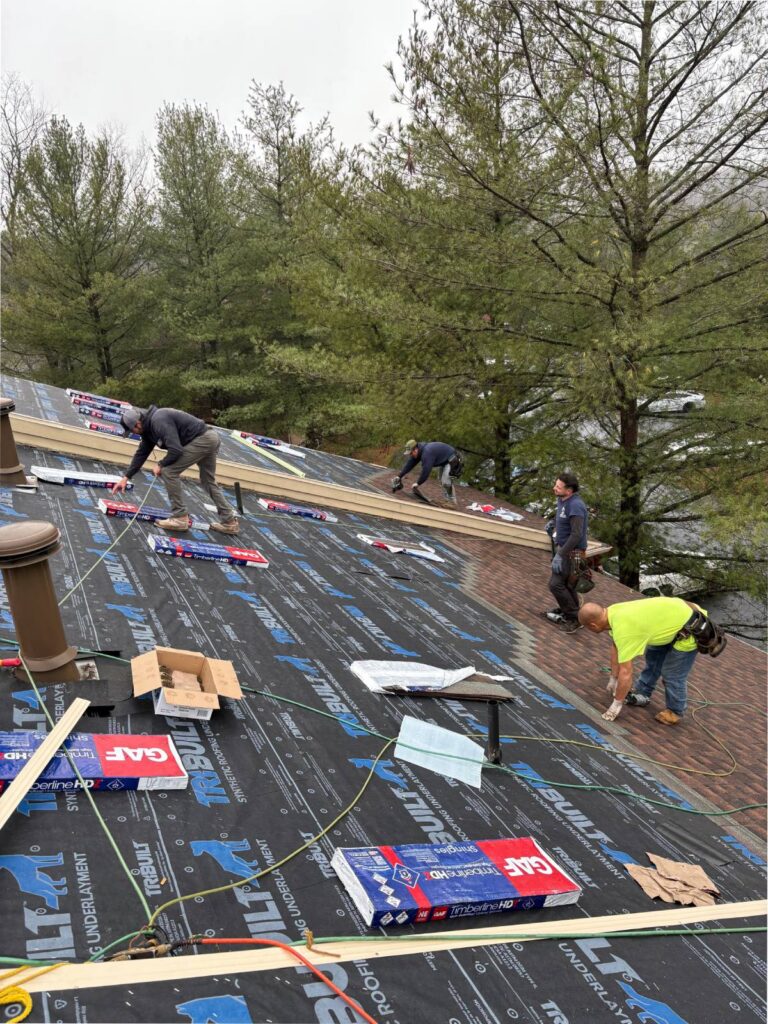 Roofing crew on a residential roof